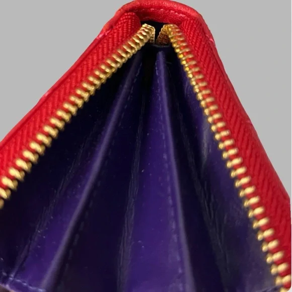 Henri Bendel red quilted wallet with a gold-tone logo. - Picture 15 of 16